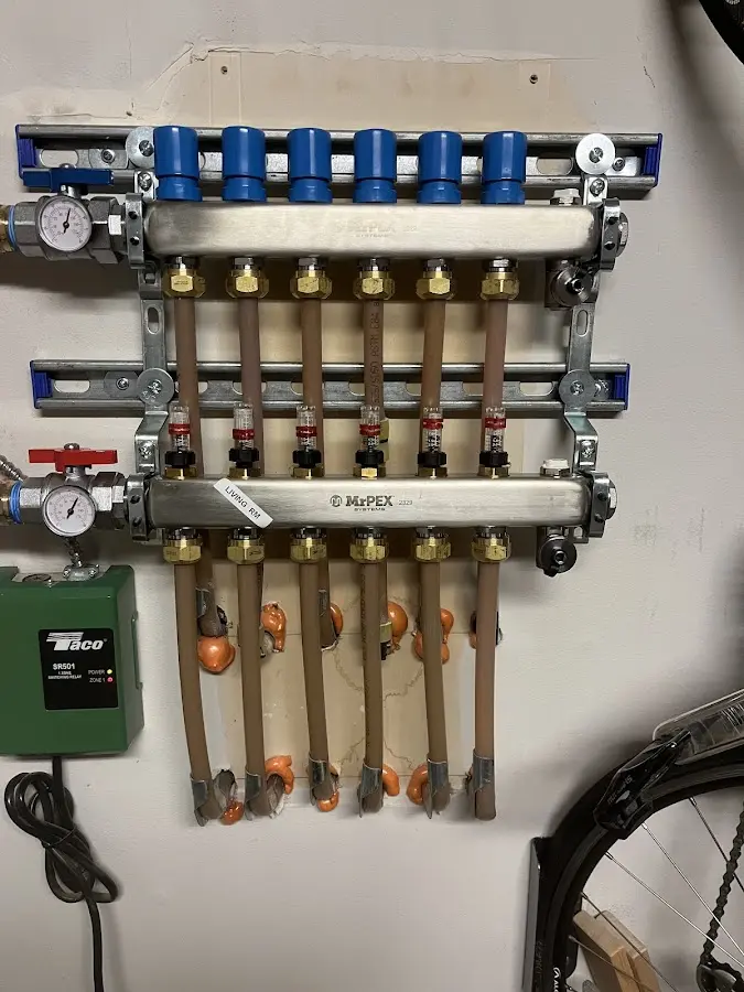 Plumber performing Water Heater Repair at a residential property in Lakeville